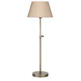 The hicks table lamp base is a single simple stem lamp finished in antique brass with a single gas button decorative feature on the side, the lamp base is smooth and flat and circular, designed on the old retro gas lamps its a simple timeless design, we show it here with a neutral taupe shade that is tapered from the top to bottom of the shade, it is 20cm diam at the bottom of the shade and is not included in the price of the lamp but it can be ordered additionally with a huge choice of colours available.